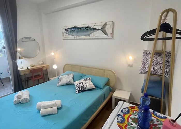Cortile San Luigi Gæstehus 3*