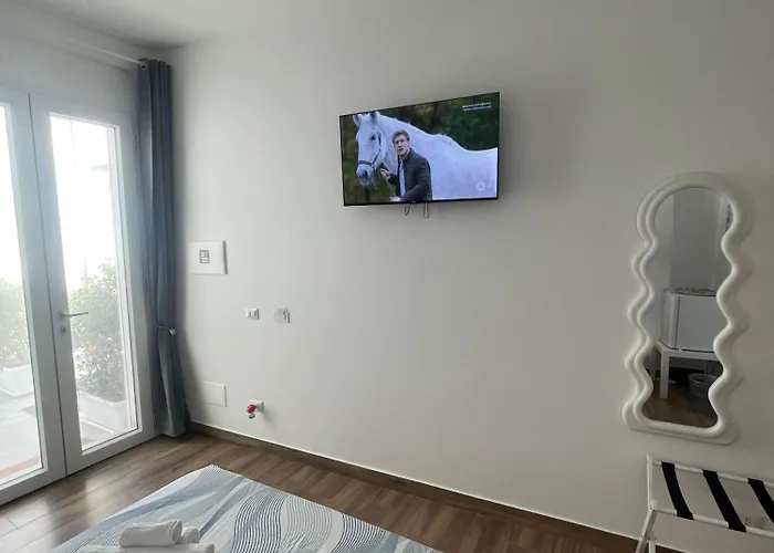 Cortile San Luigi Gæstehus 3*