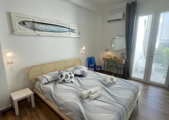Cortile San Luigi Gæstehus 3*