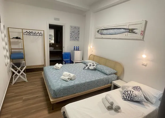 Cortile San Luigi Gæstehus 3*