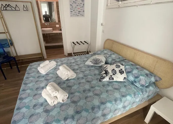 Cortile San Luigi Gæstehus 3*